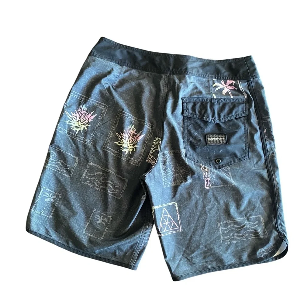 Quicksilver sustainable designed n Hawaii gray pink tiki hawaiin done